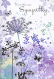 This sympathy card unfolds like a gentle, visual poem, painted in cool, calming shades of lavender, indigo, and misty blue that echo a quiet evening sky over Millwall's riverside. Airy silhouettes of wildflowers reach upward from the base of the design, their stems fine and graceful, their umbel-shaped flower heads opening into intricate clusters that resemble delicate lace against a softly washed background. The colours are layered in transparent watercolour veils-soft purples blending into blue-greys and hints of green-creating the impression of a distant, dreamlike meadow glimpsed through early morning mist. Pale suggestions of additional foliage drift across the scene, barely defined, adding depth without disturbing the soothing mood. Here and there, butterflies hover close to the blooms, their wings rendered in such light, translucent strokes that they appear almost weightless, like a tender presence at a funeral or memorial gathering. The entire composition is hushed and respectful, the kind of quiet beauty that matches the serenity of a still moment beside the Thames or a reflective pause walking home through the streets of Millwall after visiting a loved one. Subtle lighting softens every edge, with no harsh contrasts, allowing the eyes to move gently from stem to stem, petal to petal. As a local florist used to guiding families through moments of loss, I sense in this card a deeply considerate intention: to offer sympathy that is understated yet heartfelt, wrapping the recipient in cool, comforting colour and the quiet reassurance of nature's ongoing, tender presence.